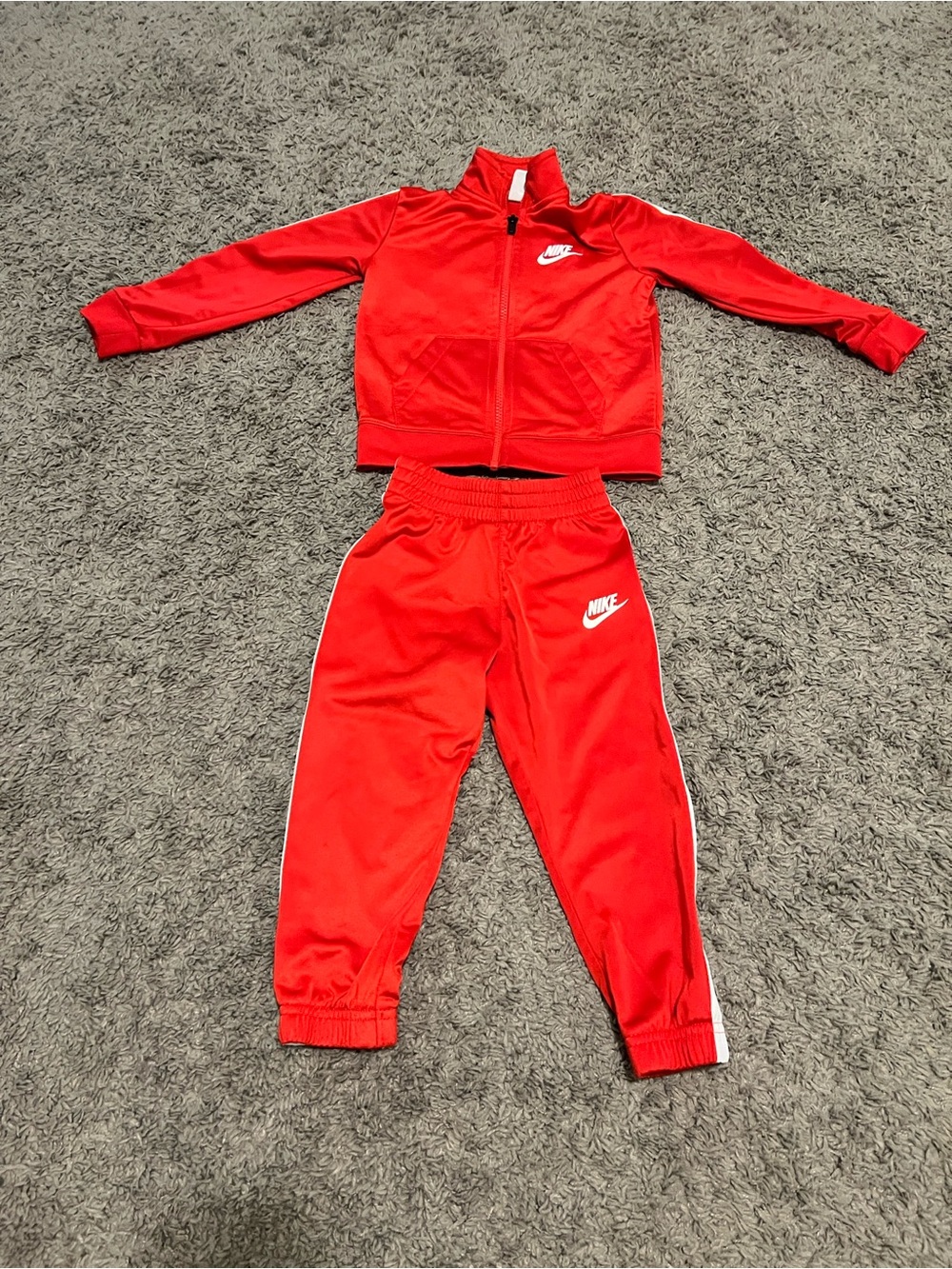 Nike Red Kids' Zip Jacket with Black Zipper Detail